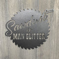 Sawdust Is Man Glitter Metal Sign Cutout - Metal Sign for Woodworkers: "Sawdust is Man Glitter" Text on Sawblade Shaped Design