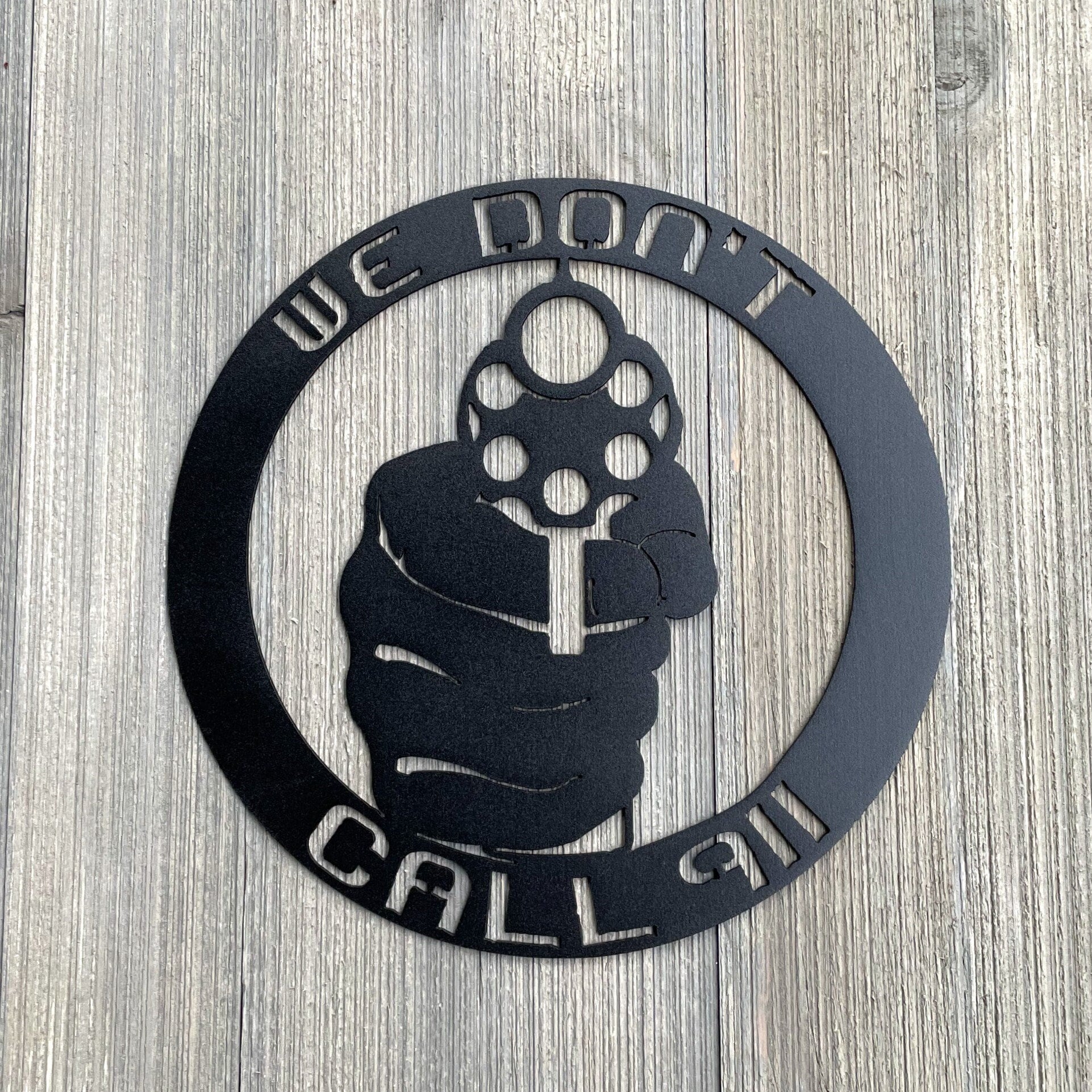 We Don't Call 911 Metal Sign Cutout - Protection and Intimidation at Its Best - 'We Don't Call 911' Powder Coated Sign with Revolver Design