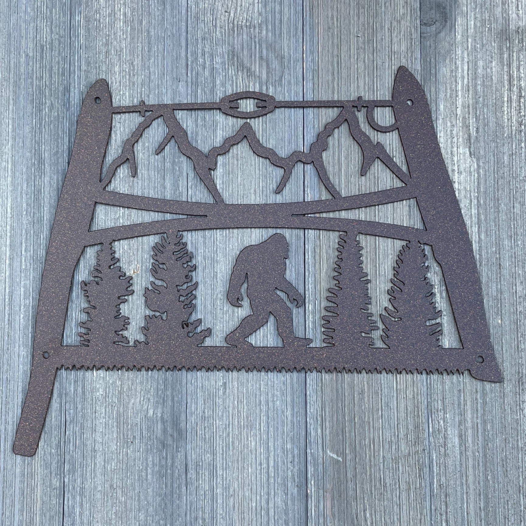 Timber Legend: Vintage Bow Saw with Bigfoot Metal Sign Cutout - Sasquatch Sign
