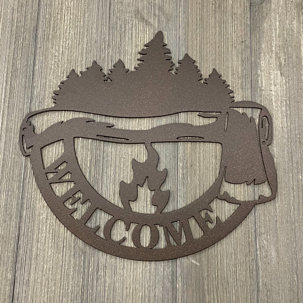 Welcome to the Woods Metal Sign: Axe, Campfire and Tree Silhouette
