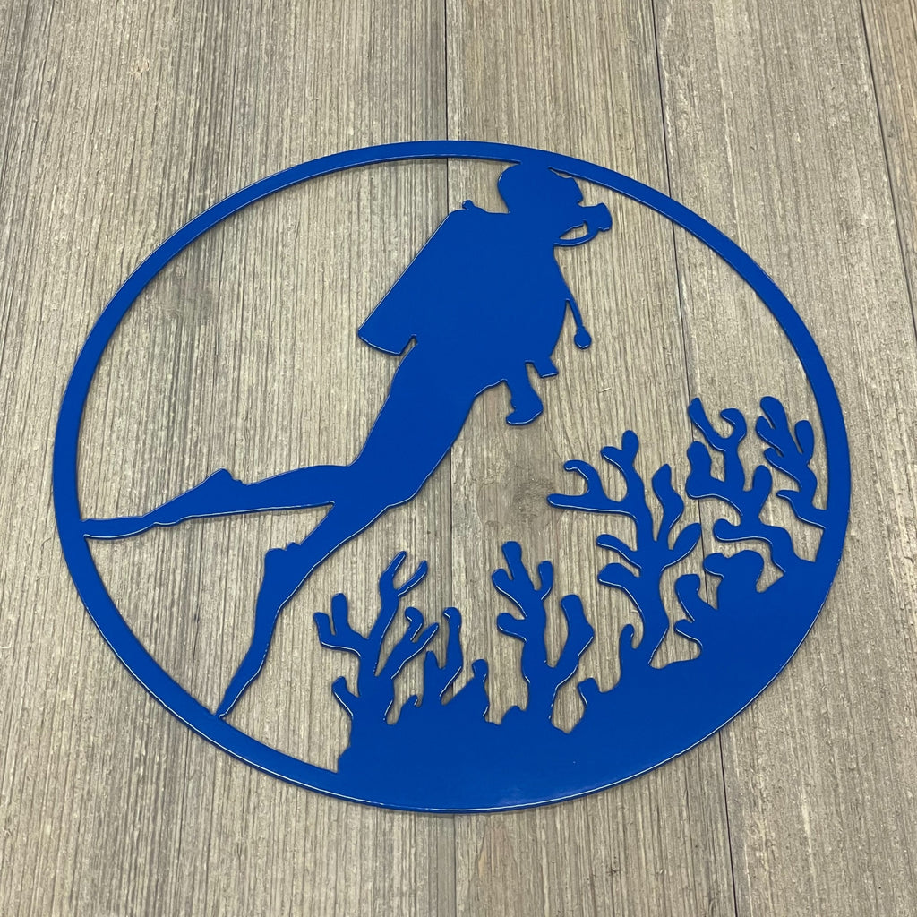 Deep Blue Serenity: Metal Sign featuring Scuba Diver Amidst Vibrant Coral Reef