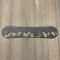 Metal Snowboard with Mountain Treeline Sign And Mountain Silhouette