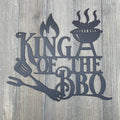 King of the BBQ: Metal Sign with Grill Cutout and Utensil Accents – Premium Grill Master Decor