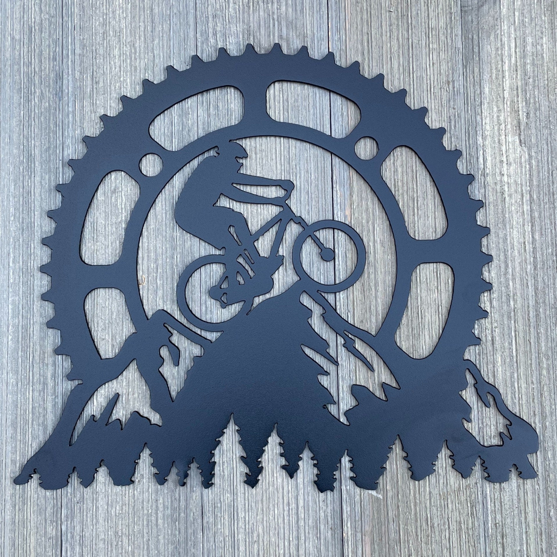 Mountain Bike Scene with Bike Gear and Mountain Silhouette Metal Sign Cutout