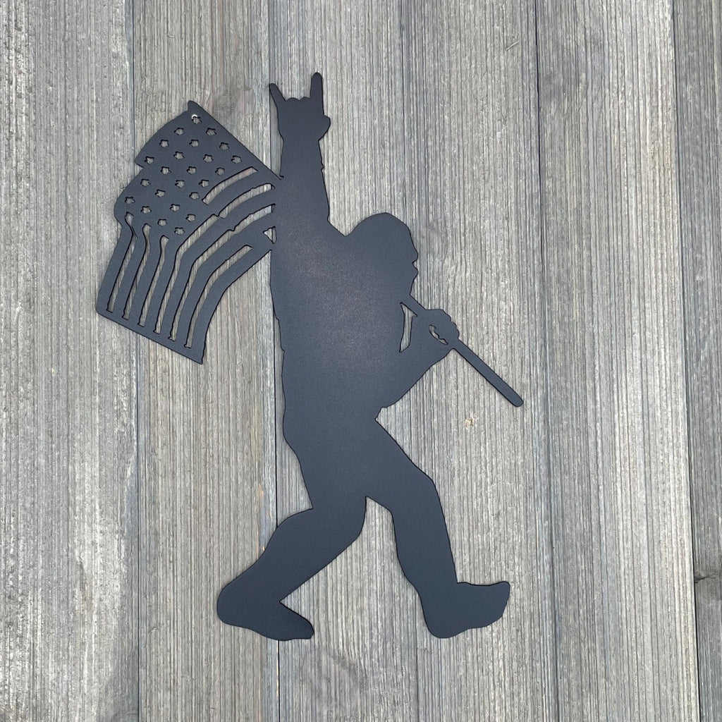 Sasquatch Patriot: Metal Sign with Flag-Holding Bigfoot