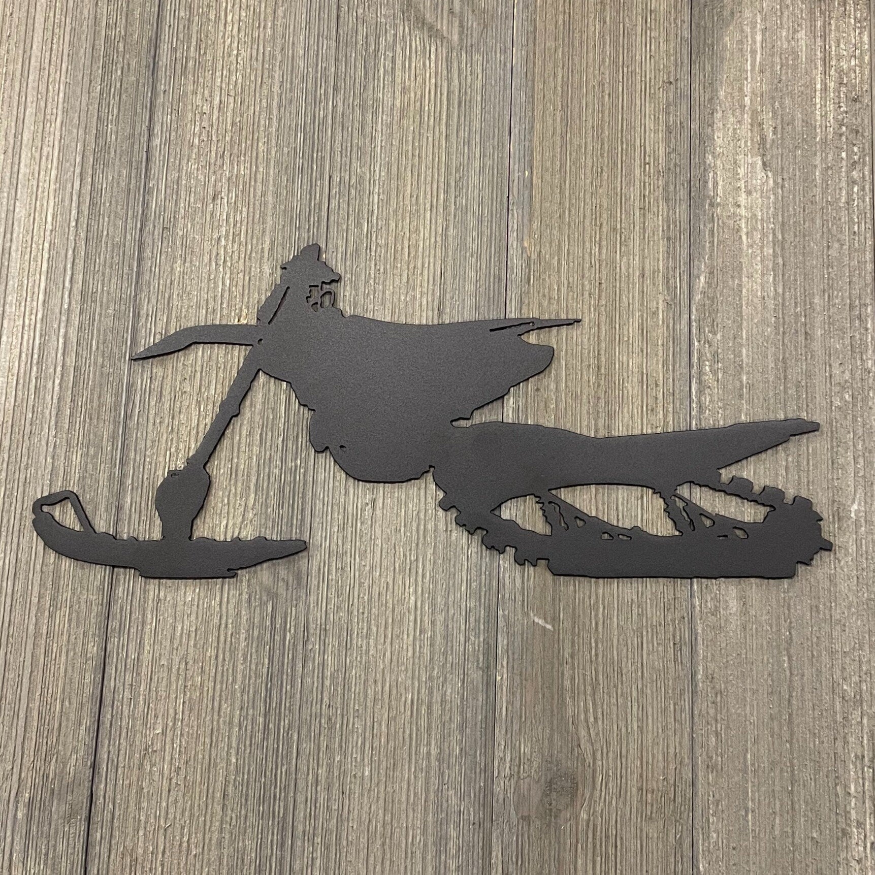 Snowbound Thrills: Metal Snowbike Sign for Winter Adventurers