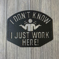 I Don’t Know, I Just Work Here Metal Sign - Funny Shrugging Employee Design